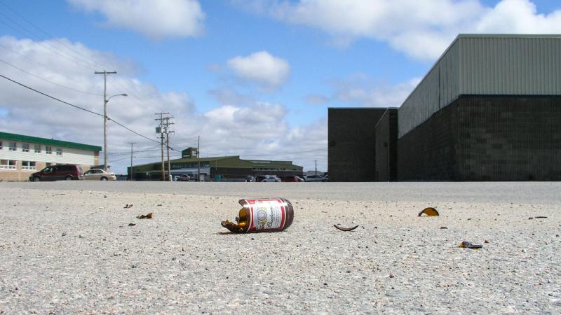Broken beer bottle on the ground