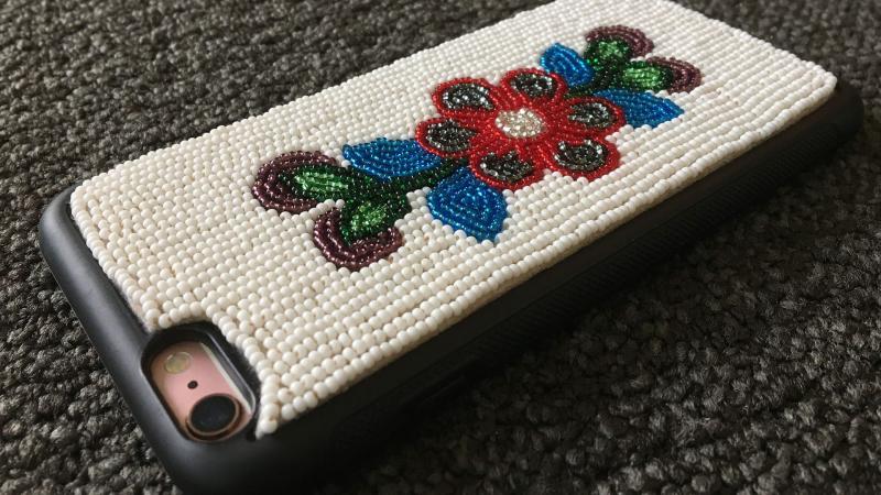 Cell phone with traditional embroidery
