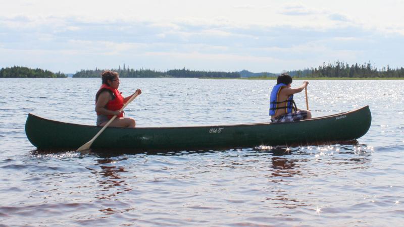 2 people in a canoe