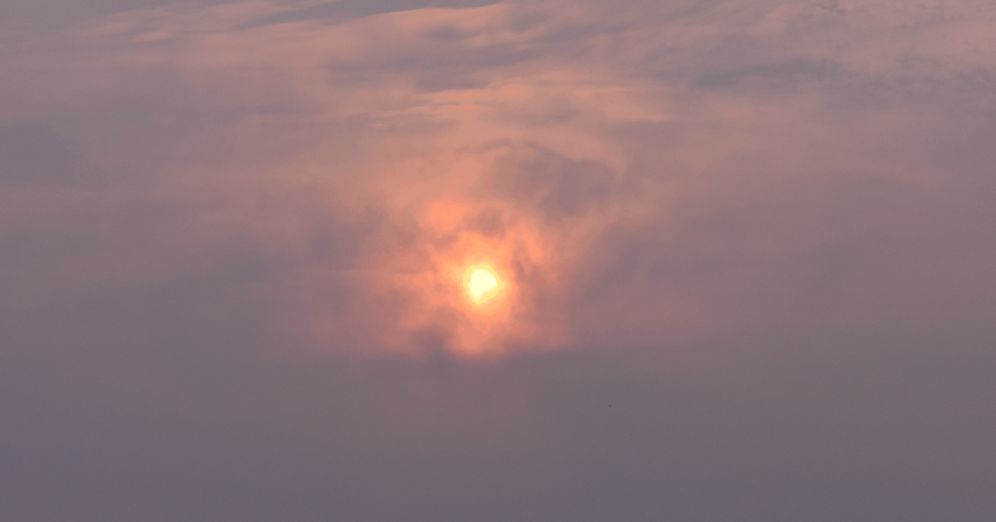 Sun seen through smoke from a forest fire
