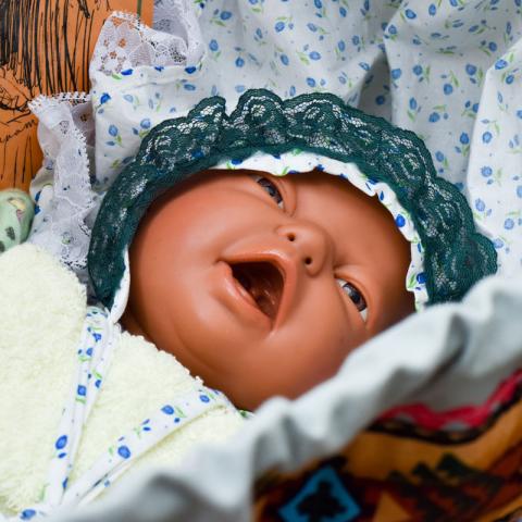 Flat baby sales doll head